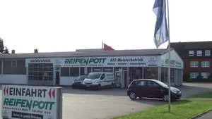 Filiale von Reifen-Pott in Warendorf mit Einfahrtsschild und Kfz-Meisterbetrieb-Beschriftung